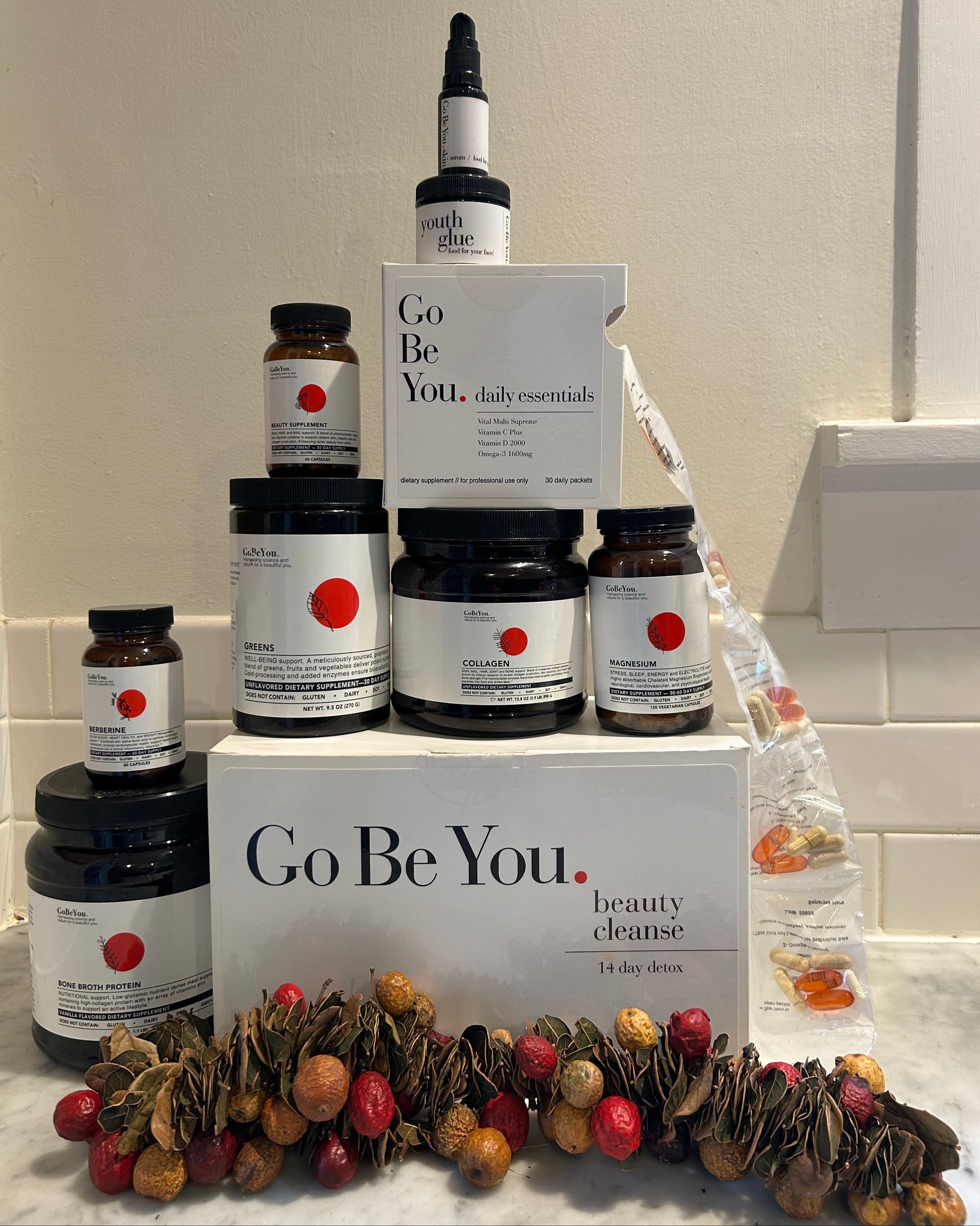 All GoBeYou. products with a fall arrangement placed below.